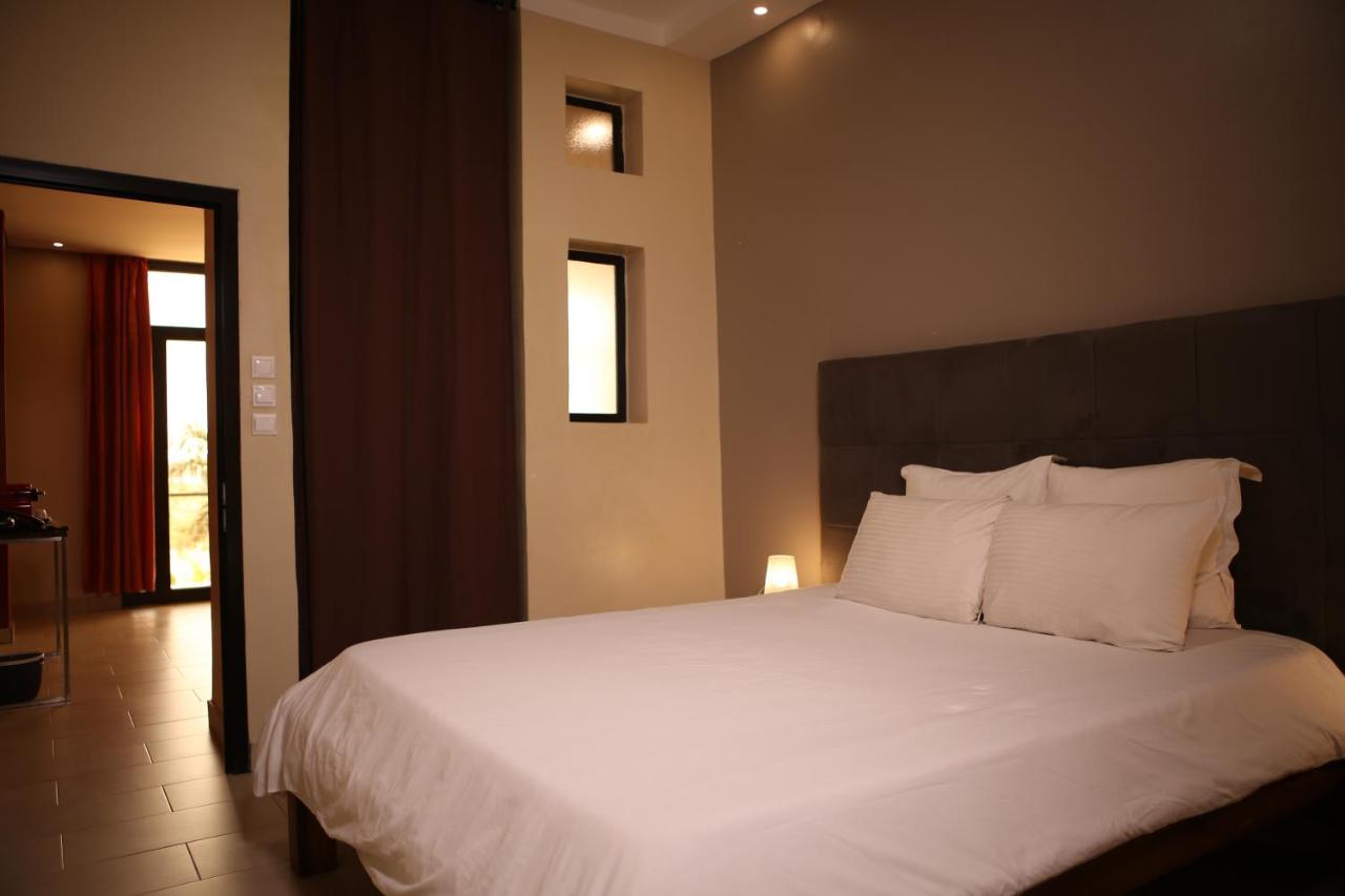 Au Bord De L'Eau Hotel Бамако Екстериор снимка